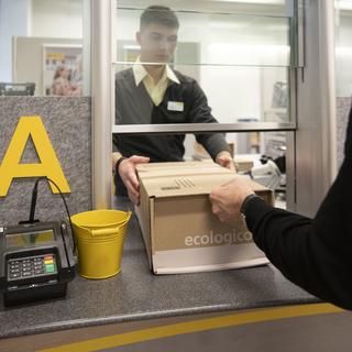 La Poste suisse a atteint une ponctualité élevée l'année passée. [KEYSTONE - Christian Beutler]