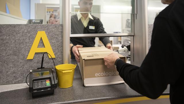 La Poste suisse a atteint une ponctualité élevée l'année passée. [KEYSTONE - Christian Beutler]