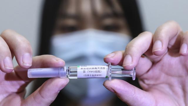 En Chine, les vaccins administrés ne sont pas encore validés. [AP - Zhang Yuwei]