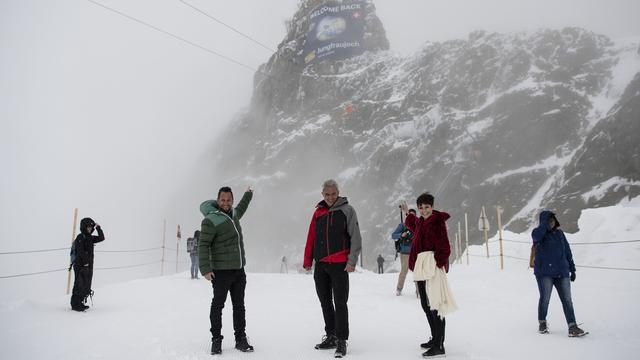 Peu de touristes sont présents pour la réouverture du train de la Jungfrau. [Keystone - Peter Schneider]