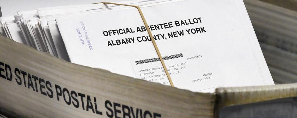 Le vote par correspondance devrait être largement utilisé pour l'élection présidentielle américaine. [Keystone - AP Photo/Hans Pennink]