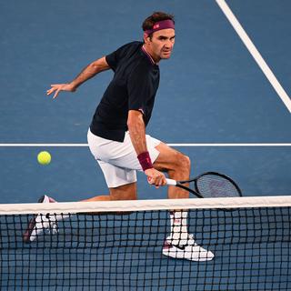 Roger Federer a frisé le code dans une "night-session" de haut vol. [AFP - William West]