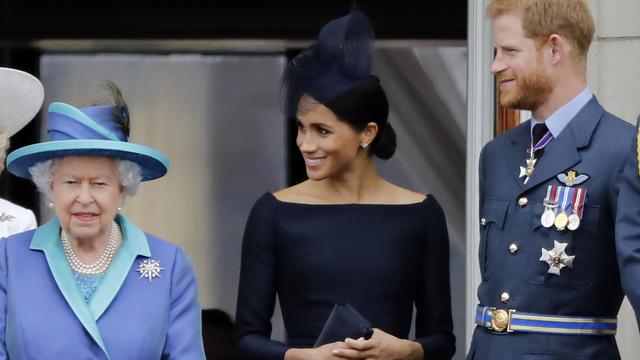 La reine Elizabeth II, Meghan et Harry, le 10 juillet 2018. [afp - Tolga Akmen]