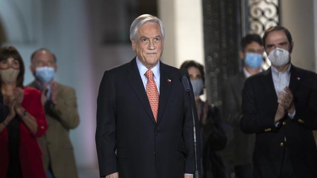 Le président chilien Sebastian Pinera a appelé le peuple chilien à l'unité après l'acceptation du projet de nouvelles Constitution. [AFP - CLAUDIO REYES]