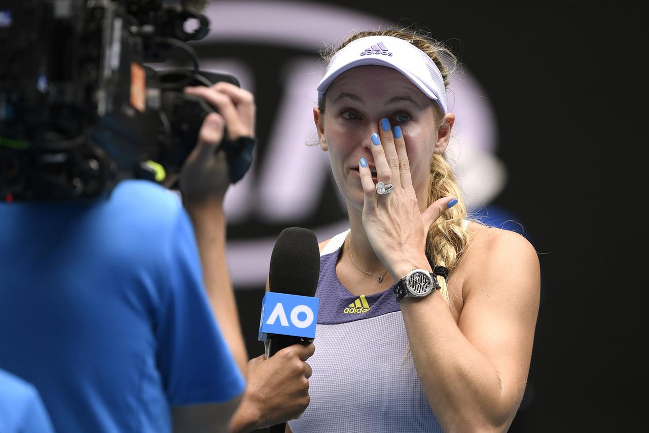 Caroline Wozniacki, émue après son dernier match. [AP - Andrew Brownbill]