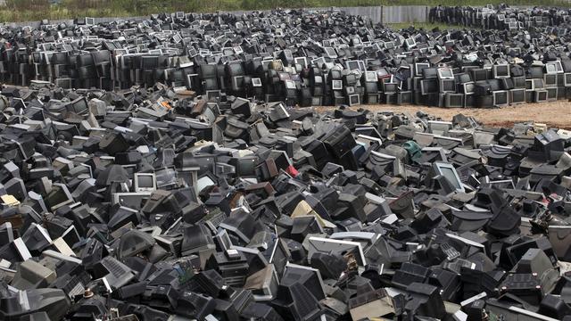 Montagne de téléviseurs en attente de recyclage à Zhuzhou en 2013. [AP/Keystone]