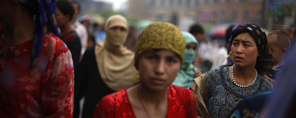 Femmes de la communauté ouïghoure à Hotan, dans la province chinoise du Xinjiang. [AP/Keystone - Elizabeth Dalziel]