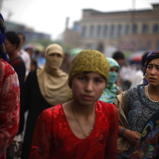 Femmes de la communauté ouïghoure à Hotan, dans la province chinoise du Xinjiang. [AP/Keystone - Elizabeth Dalziel]