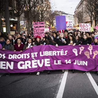 Manifestions lors de la journée internationale pour les droits des femmes le vendredi 8 mars 2019 à Lausanne. [Keystone - Jean-Christophe Bott]