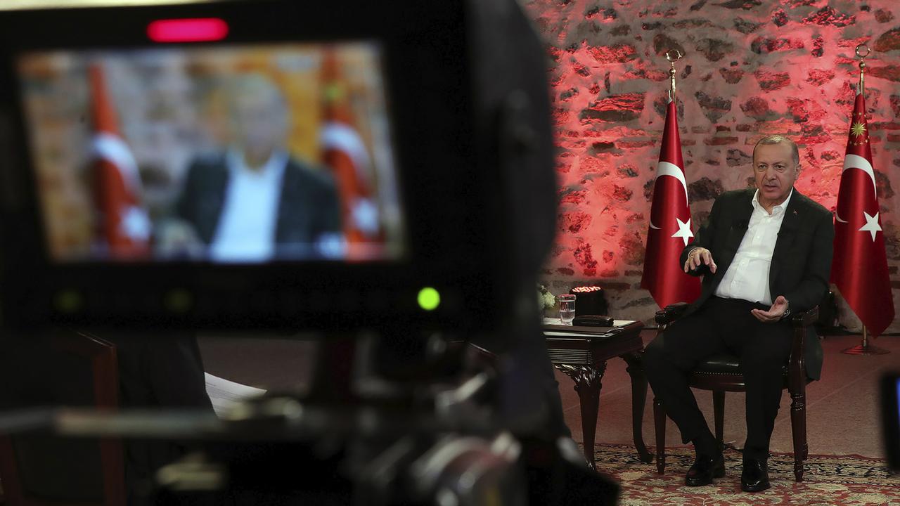Recep Tayyip Erdogan a annoncé le début du déploiement de soldats turcs en Libye. [Keystone/AP - Presidential Press Service]
