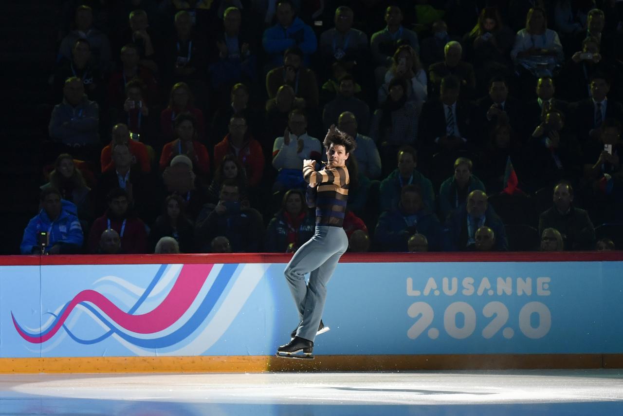 Médaillé aux JO 2006, Stéphane Lambiel a animé cette cérémonie d'ouverture. [Keystone - Jean-Christophe Bott]