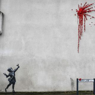 Une oeuvre attribuée à Banksy dans les rues de Bristol, en Angleterre. [AFP - Ben Birchall]