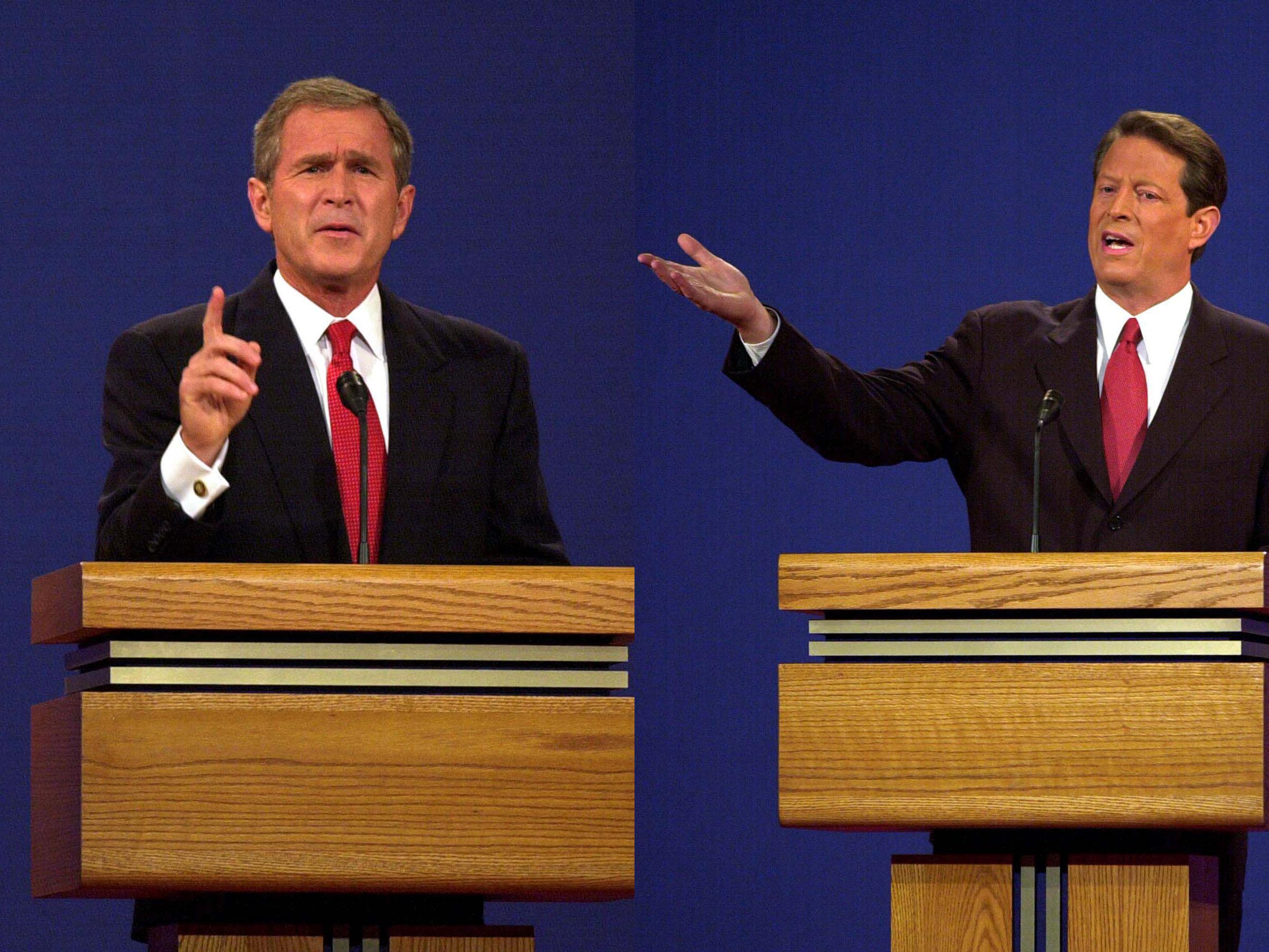 George W.Bush et Al Gore en 2000. [AFP - STAN HONDA]