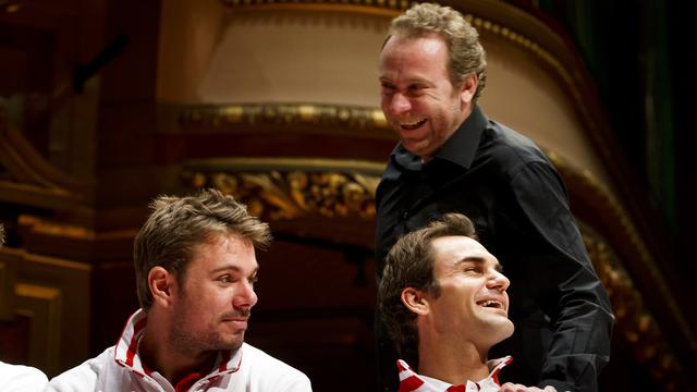 Marc Rosset, ici avec Stan Wawrinka et Roger Federer à Genève, espère que les Suisses poursuivront leur chemin à l'Open d'Australie. [Keystone - Salvatore Di Nolfi]