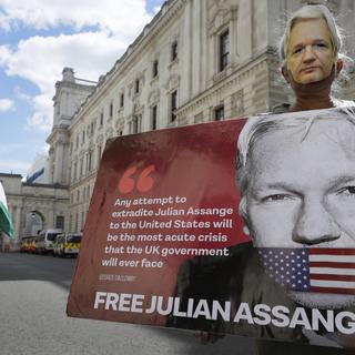 Les Etats-Unis demandent l'extradition de Julian Assange afin de le juger pour la diffusion de centaines de milliers de documents confidentiels. [AP/Keystone - Kirsty Wigglesworth]
