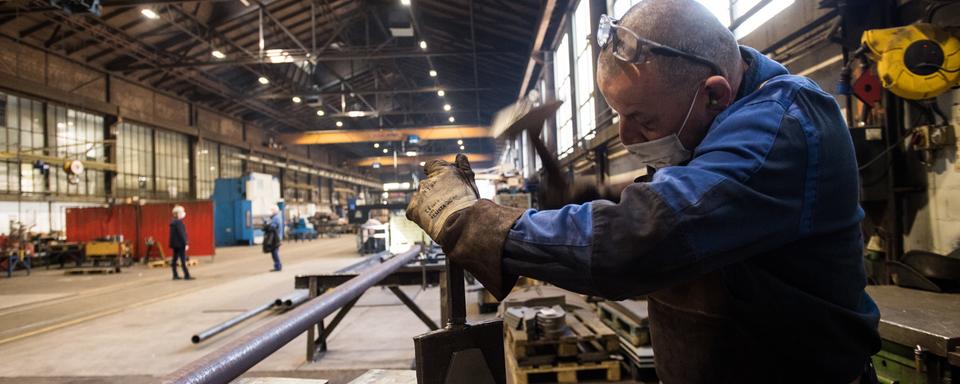 Le président de Swissmem anticipe des licenciements en masse dans le secteur industriel. [Keystone - Alessandro Crinari]