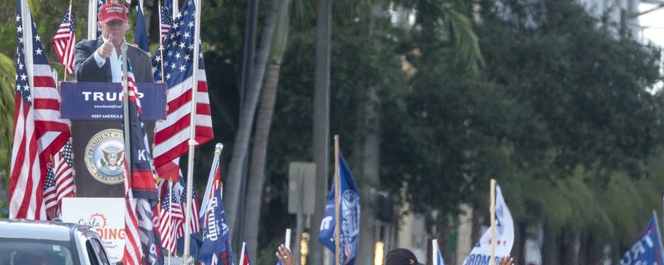 Des supporters de Trump en Floride. [Keystone - EPA/Cristobal Herrera-Ulashkevich]