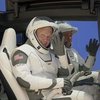 Les deux astronautes qui partiront du centre spatial Kennedy pour tester la capsule Crew Dragon, développée par Space X. [Keystone - EPA/NASA/Bill Ingalls]