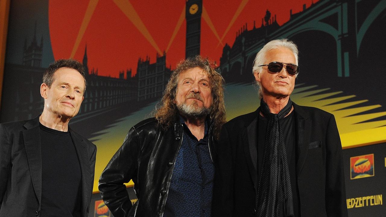 Les membres du groupe de rock Led Zeppelin John Paul Jones, Robert Plant et Jimmy Page le 21 septembre 2012 à Londres. [AFP - Andy Rain]