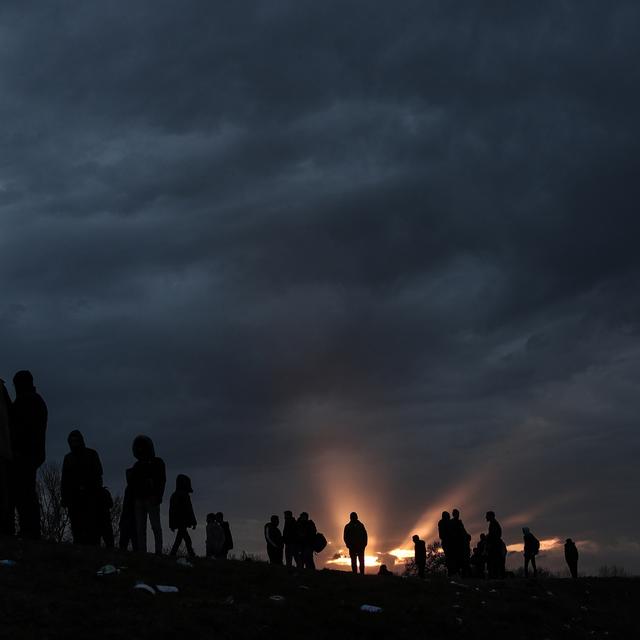 Des migrants en Turquie proches de la frontière grecque. [EPA/Keystone - Sedat Suna]