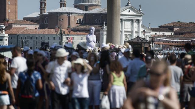 Des pays comme l'Italie sont beaucoup plus dépendants du tourisme que ceux du nord de l'Europe. [Keystone - Christian Beutler]