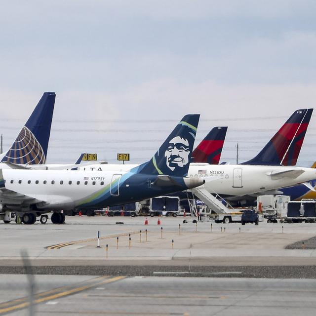 Des avions parqués à l'aéroport de Salt Lake City. [Keystone/AP - Steve Griffin]