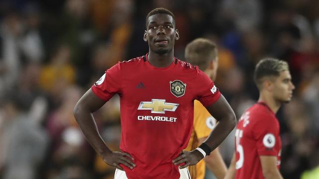 En l'état, la valeur de Paul Pogba diminuerait de presque la moitié selon l’Observatoire du football CIES. [Keystone - Nick Potts]