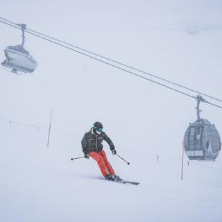 Les stations de ski autrichiennes peuvent rester ouvertes depuis le 24 décembre, avec des mesures de sécurité très sévères. [afp - Stringer]