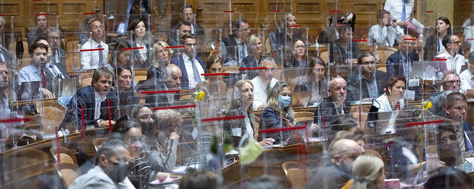 La question du profilage à haut risque a divisé le Parlement pendant trois ans. [Keystone - Peter Klaunzer]