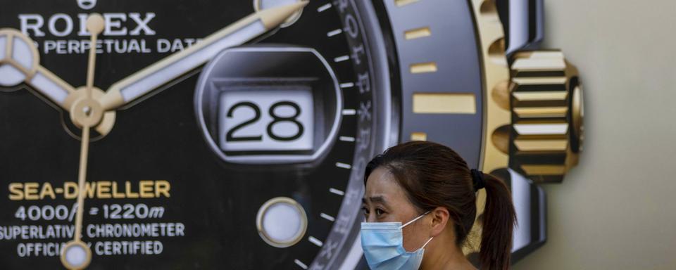 Une publicité Rolex à Shangaï en Chine. [Keystone/EPA - Alex Plaveski]