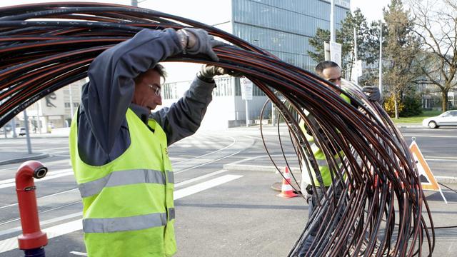 La ComCo ouvre une enquête sur le réseau de fibre optique de Swisscom. [Keystone - Salvatore di Nolfi]