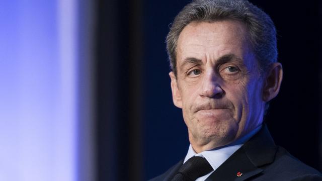 Nicolas Sarkozy a été mis en examen une quatrième fois dans l'affaire du financement libyen. [AFP - MARTIN BUREAU]