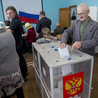 Une votation en Russie (image prétexte). [AP/Keystone - Pavel Golovkin]