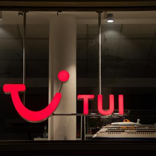 Le premier voyagiste mondial TUI va supprimer 8000 postes dans le monde. [Keystone/epa - Christian Bruna]