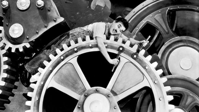 Charlie Chaplin dans "Les Temps modernes". [AFP / Charles Chaplin Productions / Collection ChrisopheL]