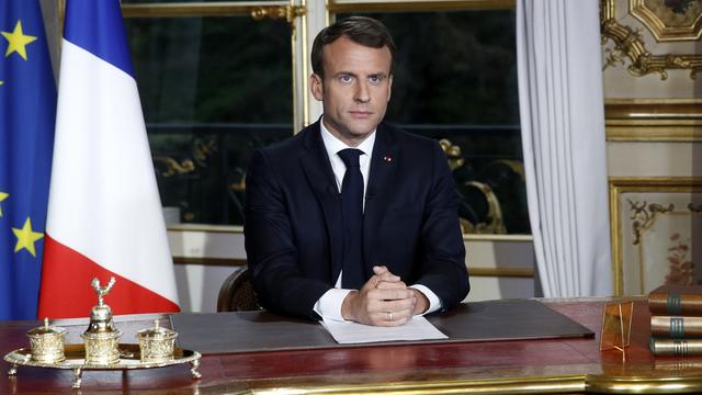 Emmanuel Macron lors d'une intervention depuis l'Elysée, 16.04.2019. [AP/Keystone - Yoan Valat]