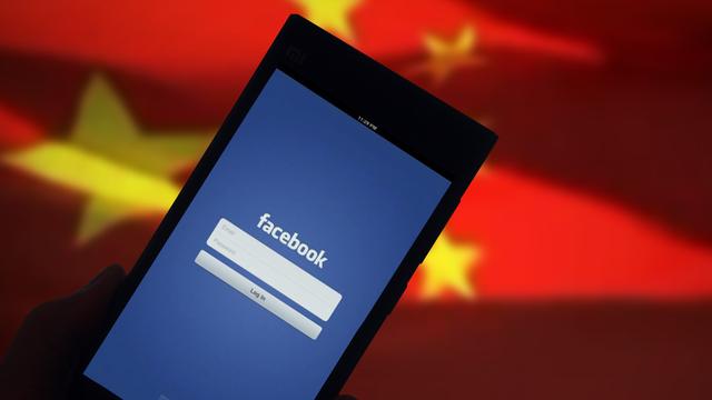 La Chine fustige les mesures de Facebook visant les médias d'Etat. [AFP - Da Qinq]