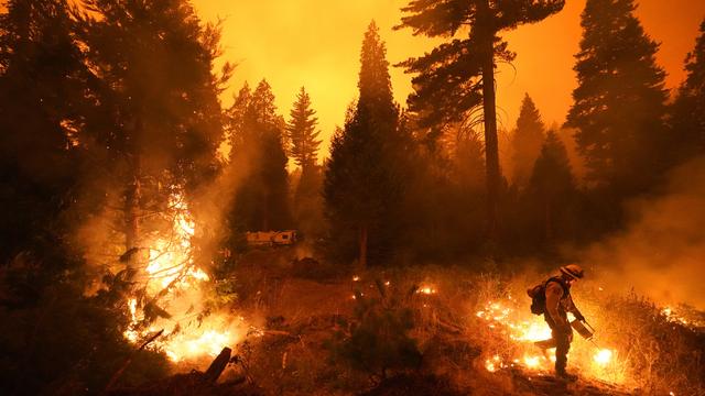 Les incendies qui ravagent la Californie ont déjà causé huit décès. [Keystone/AP - Marcio Jose Sanchez]