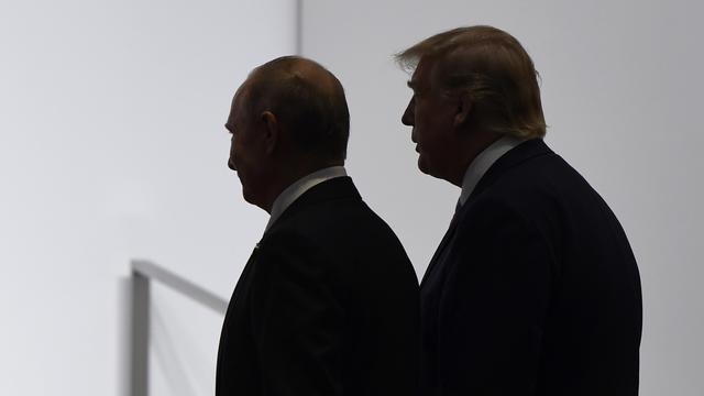 FILE - In this June 28, 2019, file photo, President Donald Trump and Russian President Vladimir Putin walk to participate in a group photo at the G20 summit in Osaka, Japan. The Trump administration is notifying international partners that it is pulling out of a treaty that permits 30-plus nations to conduct unarmed, observation flights over each otherâÄ&#x2122;s territory âÄ&#x201d; overflights set up decades ago to promote trust and avert conflict. The administration says it wants out of the Open Skies Treaty because Russia is violating the pact and imagery collected during the flights can be obtained quickly at less cost from U.S. or commercial satellites. (AP Photo/Susan Walsh, File) [Keystone/AP - Susan Walsh]