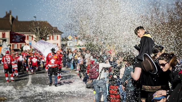 Le carnaval des Brandons de Moudon ce dimanche 24 mars 2019. [Keystone - Jean-Christophe Bott]