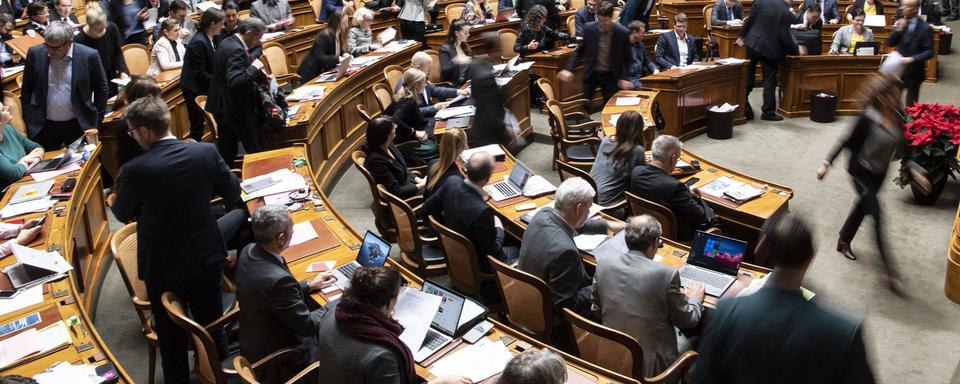 La salle du Conseil national, en décembre 2019, lors de la première session de la nouvelle législature. [Keystone - Peter Schneider]