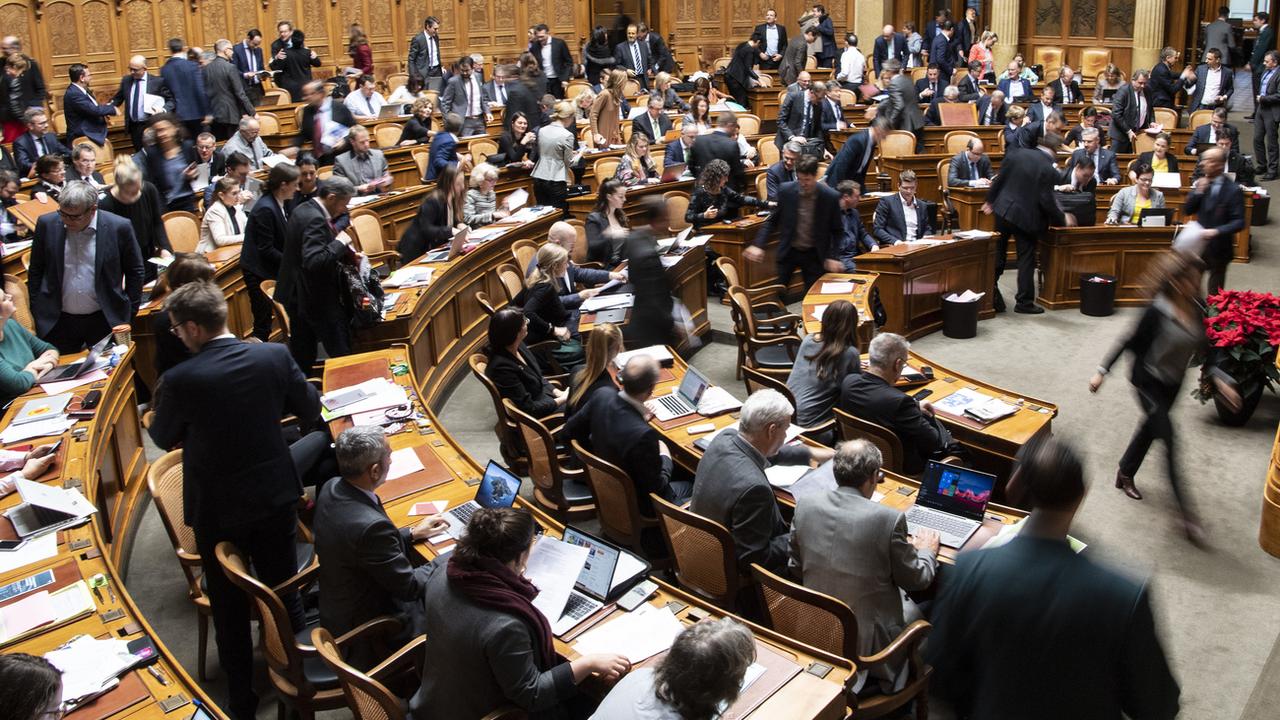 La salle du Conseil national, en décembre 2019, lors de la première session de la nouvelle législature. [Keystone - Peter Schneider]