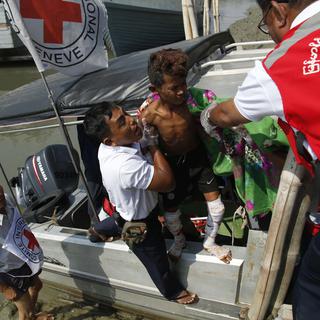 La Suisse s'inquiète de la situation humanitaire et sanitaire (ici dans l'Etat birman de l'Arakan). [EPA/Keystone - Nyunt Win]