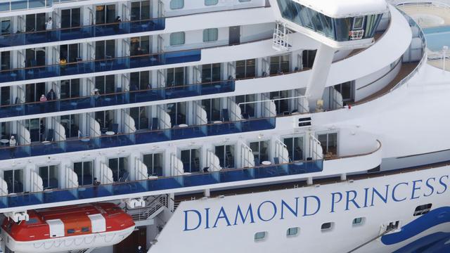 Vingt passagers du Diamond Princess infectés par le coronavirus. [Keystone - Kenzaburo Fukuhara/Kyodo News via AP]