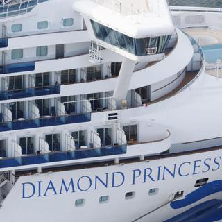 Vingt passagers du Diamond Princess infectés par le coronavirus. [Keystone - Kenzaburo Fukuhara/Kyodo News via AP]