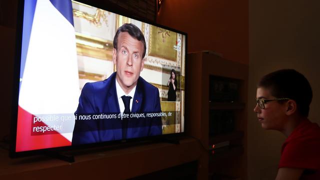 C'était la 4e intervention d'Emmanuel Macron depuis le début de la crise. [EPA/Keystone - Guillaume Horcajuelo]