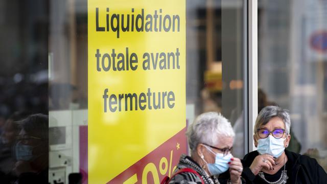 Un magasin en liquidation totale dans les rues de Lausanne. [Keystone - Laurent Gillieron]