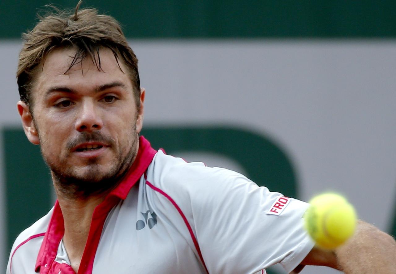 Stan Wawrinka en action ici contre Dusan Lajovic, le seul qui lui chipera une manche avant le dernier carré. [EPA - Yoan Valat]