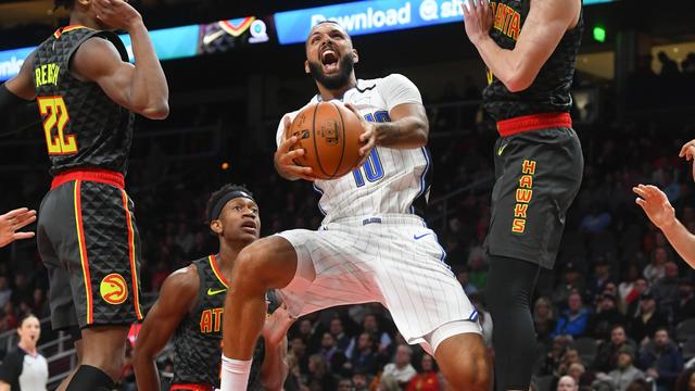 Evan Fournier risque fort de devoir attendre la prochaine saison avant de s'envoler à nouveau dans le ciel de la NBA. [AP - John Amis]