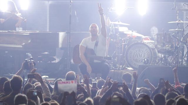 Chris Martin de Coldplay en concert en janvier 2020 en Californie devant un public fourni, des images qui semblent aujourd'hui bien loin. [Mario Anzuoni]